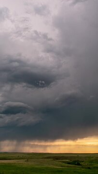 Thunderstorm moving over the plains in South Dakota in timelapse as it rains in the distance.