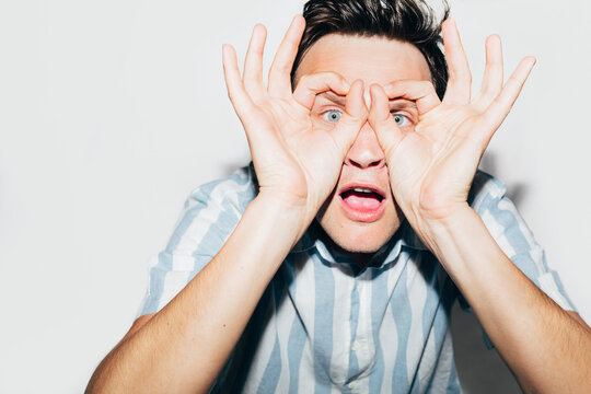 Man Holding Hands on His Face 