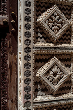 Unique and artistic decor of a wall in Pisa
