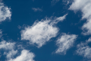 Fototapeta premium white peaceful sky, white cirrus clouds, beautiful sunny sky, blue sky, yellow lantern, minimalism, building, construction, street lamp, lanterns