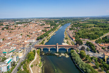 Aerial view of Pavia and the Ticino River, View of the Cathedral of Pavia, Covered Bridge. Lombardia, Italy