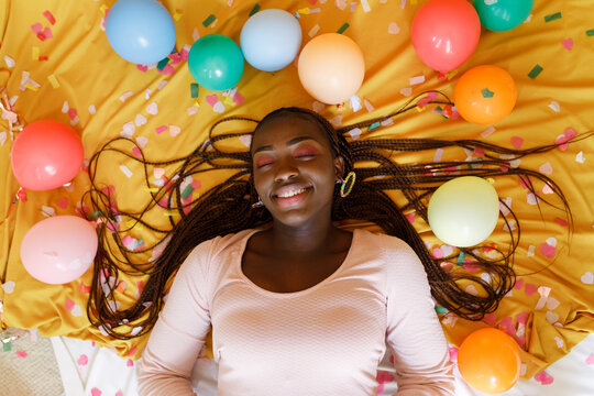 Happy woman and colourful balloons