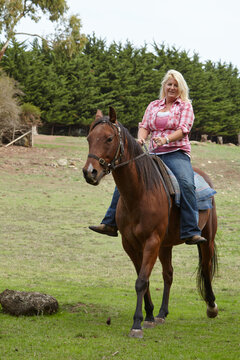 Woman riding bareback