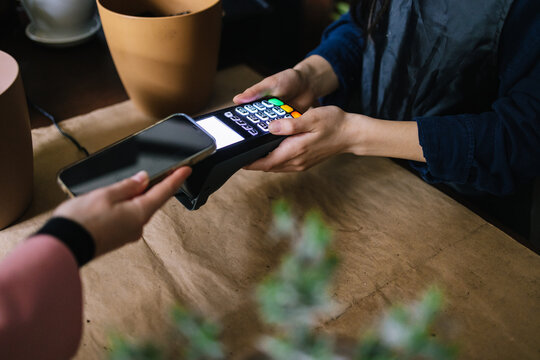 Incognito salesperson receiving payment by NFC 