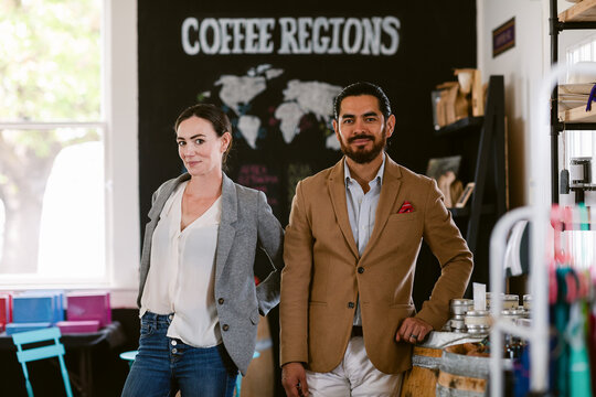 Family business owners at coffee shop portrait