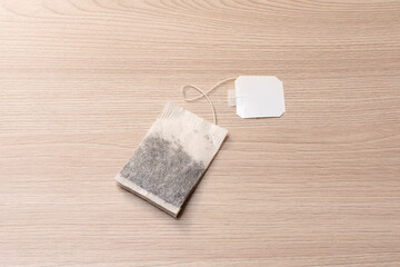 tea bag for brewing on a light wooden background