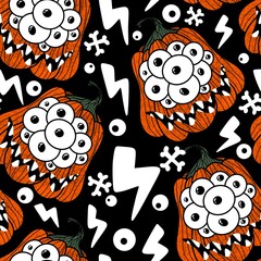 Fototapeta premium Halloween seamless monster pumpkins with eyes pattern for wrapping paper and fabrics and accessories and kids