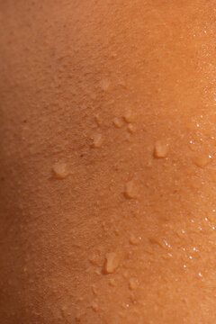 Drops of water on sweaty skin