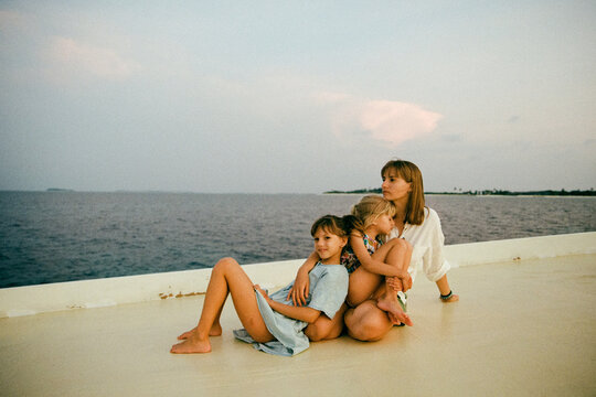 Family on the boat in the sea