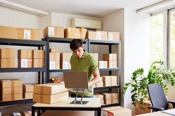 Logistic manager entering parcels into database