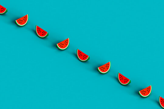a row of slices of watermelons on a blue background