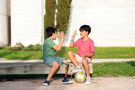 Two kids chatting and playing - Powered by Adobe