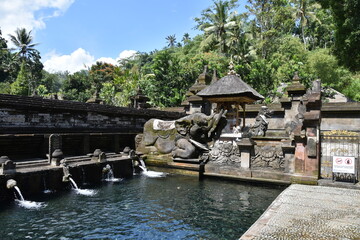 Tirta Empul Sacred Purification Pool, Right Side with Sculptures and Trees, Bali