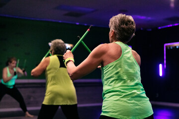 Senior Women Doing Drumming Workout