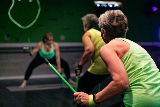 Anonymous Women Doing Drumming Exercise