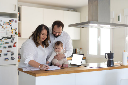 Happy family working at home