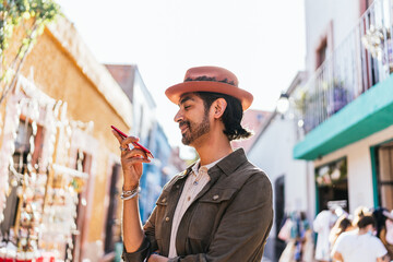 Hispanic Man Sending A Voice Message