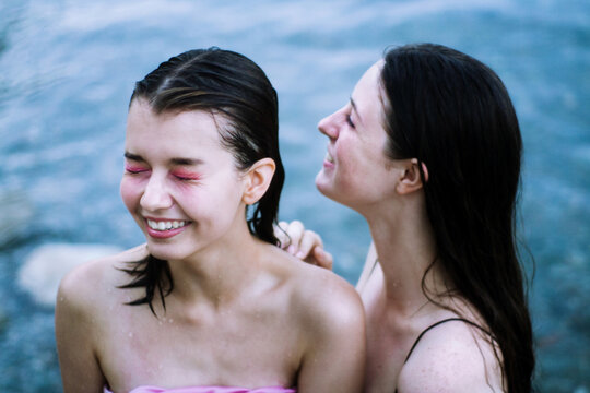 Portrait of young teenage women with purple makeup 