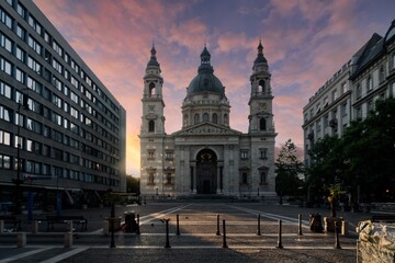 Early morning shot of St. Stephens Basilica in Budapest, Hungary with colorful clouds in the sky.