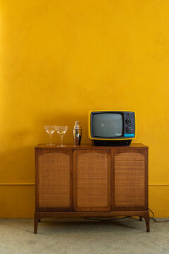 Vintage Seventies Analog Television  with martini Cocktail decor 