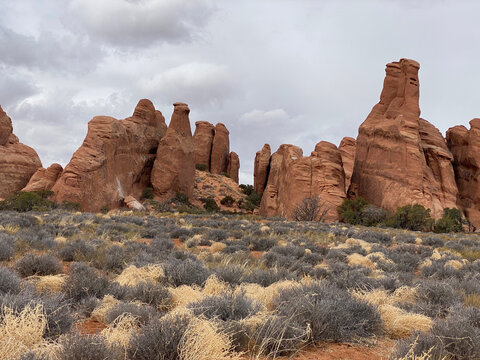 Photo of hoodoos from of the Broken Arch Trail near the Sand Dune Arch trailhead in Arches National Park located in Moab, Utah, United States USA.