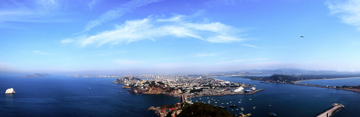 180 panoramic aereal picture of island with big city in mazatlan with soft light at the morning 