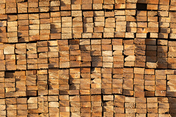 large stack of wood lumber construction supplies