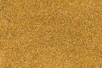 Golden yellow metal shavings waste steel recycling iron texture background