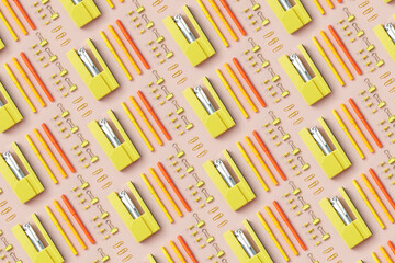 Diagonal pattern of colorful repeating office stationery
