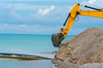 Sea wood cargo transportation ground industry truck forestry lumber machine, for loader tractor in work and bucket engineering, earth site. Material sand stone, stone