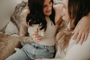 A lesbian couple getting engaged