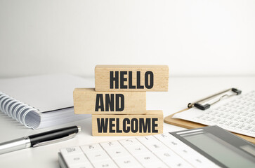Hello and welcome symbol. Concept words Hello and welcome on wooden blocks