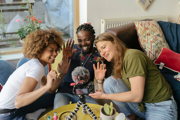 Three Friends Filming a Makeup tutorial