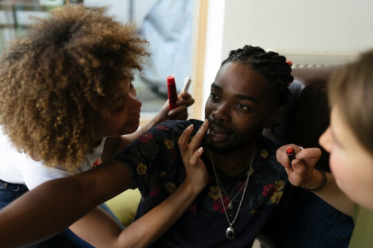 Three Friends Filming a Makeup tutorial