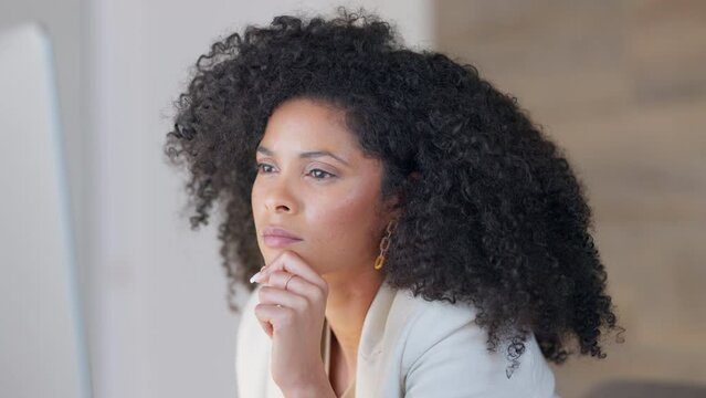 African American female lawyer reading case study. Legal professional concentrating and nodding in agreement. Smart and elegant advocate analyzing the strategy and outcome of a case