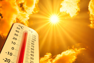 hot temperature,Thermometer on yellow sky with sun shining in summer show higher Weather, concept global warming - Powered by Adobe