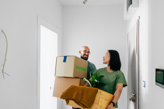 Couple Moving Into New Apartment