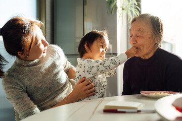 Four generations family at home