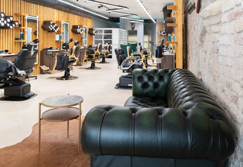 Sofa At Stylish Barbershop Room