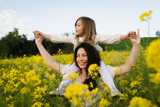 Mom And Her Daughter Having Fun Together