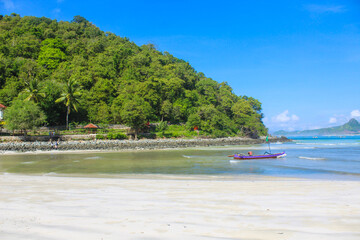 the beautiful scenery at Selong Belanak beach with clear sky and blue sea water
