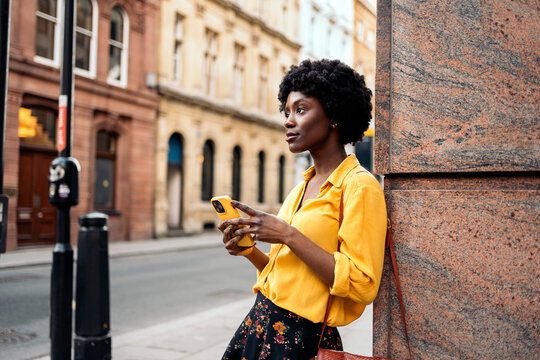 Pretty woman typing cellphone