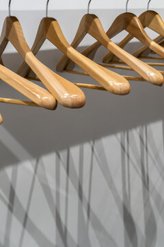 Light Wood Hangers On Clothes Rail Indoors