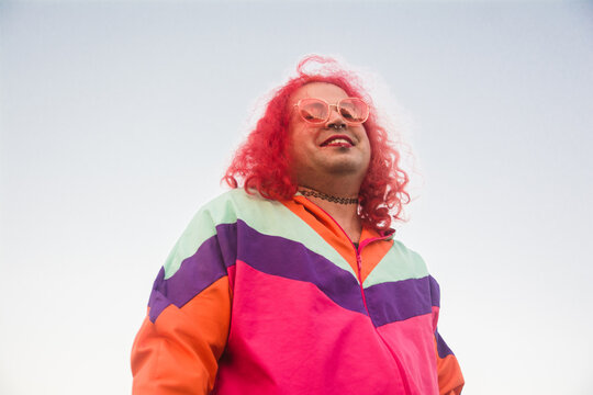 Curvy trans woman laughing joyful