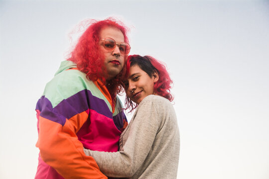 Non-binary person and transgender woman in love 