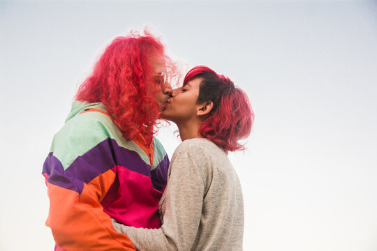 Two transgender people kissing