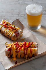 hot dog with cheddar and beer