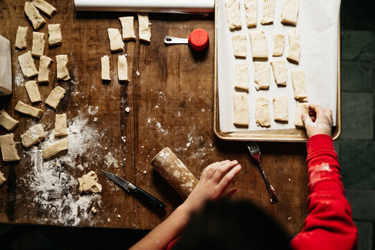 Boy Making Shortbread Cookies For Christmas 