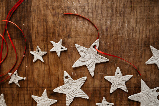  clay stars on rustic wooden table