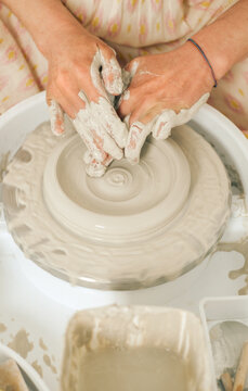 Potter's hands at work